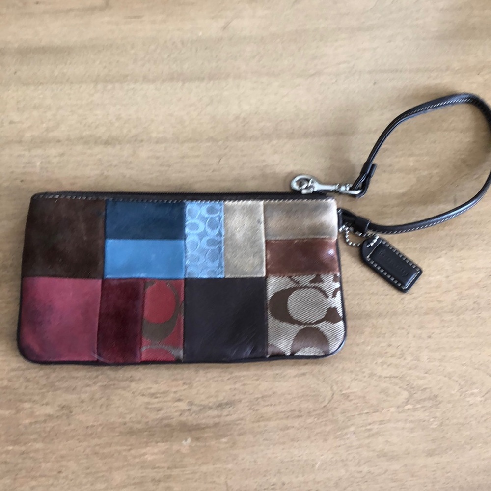 Coach signature patch wristlet.